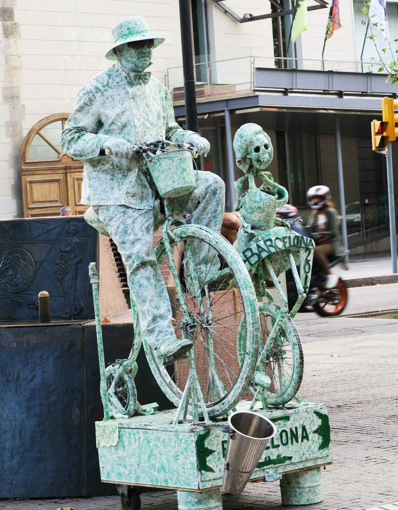 skeleton statue riding a bike in Las Ramblas, Barcelona, Spain