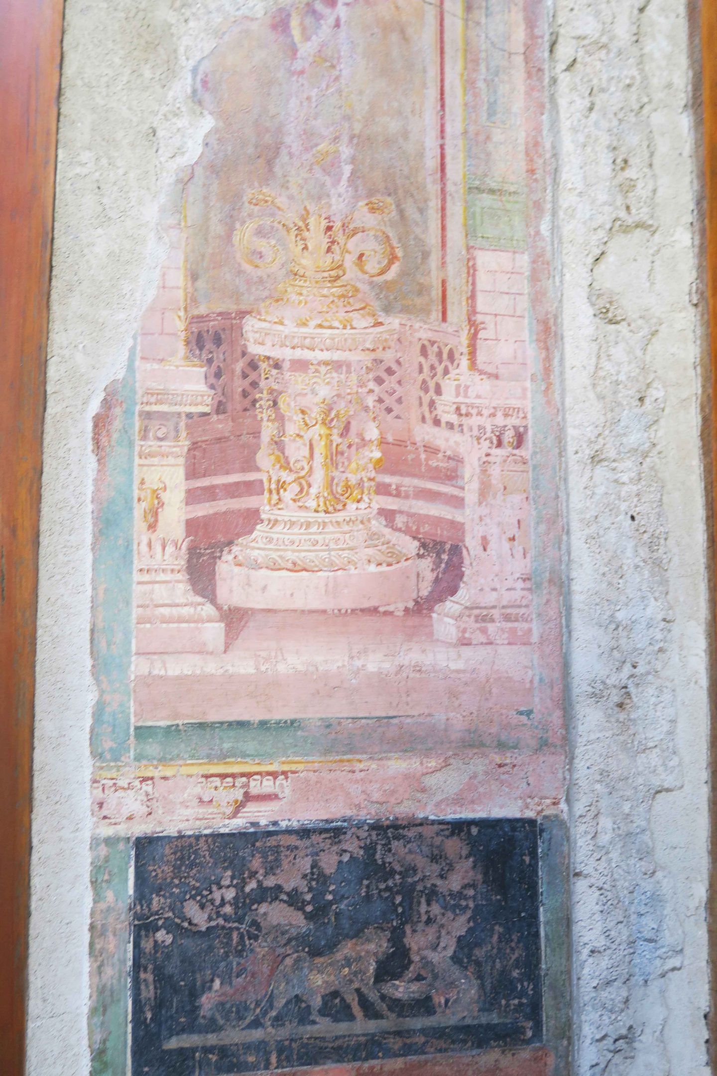 pompeii preserved painting on the wall of a statue