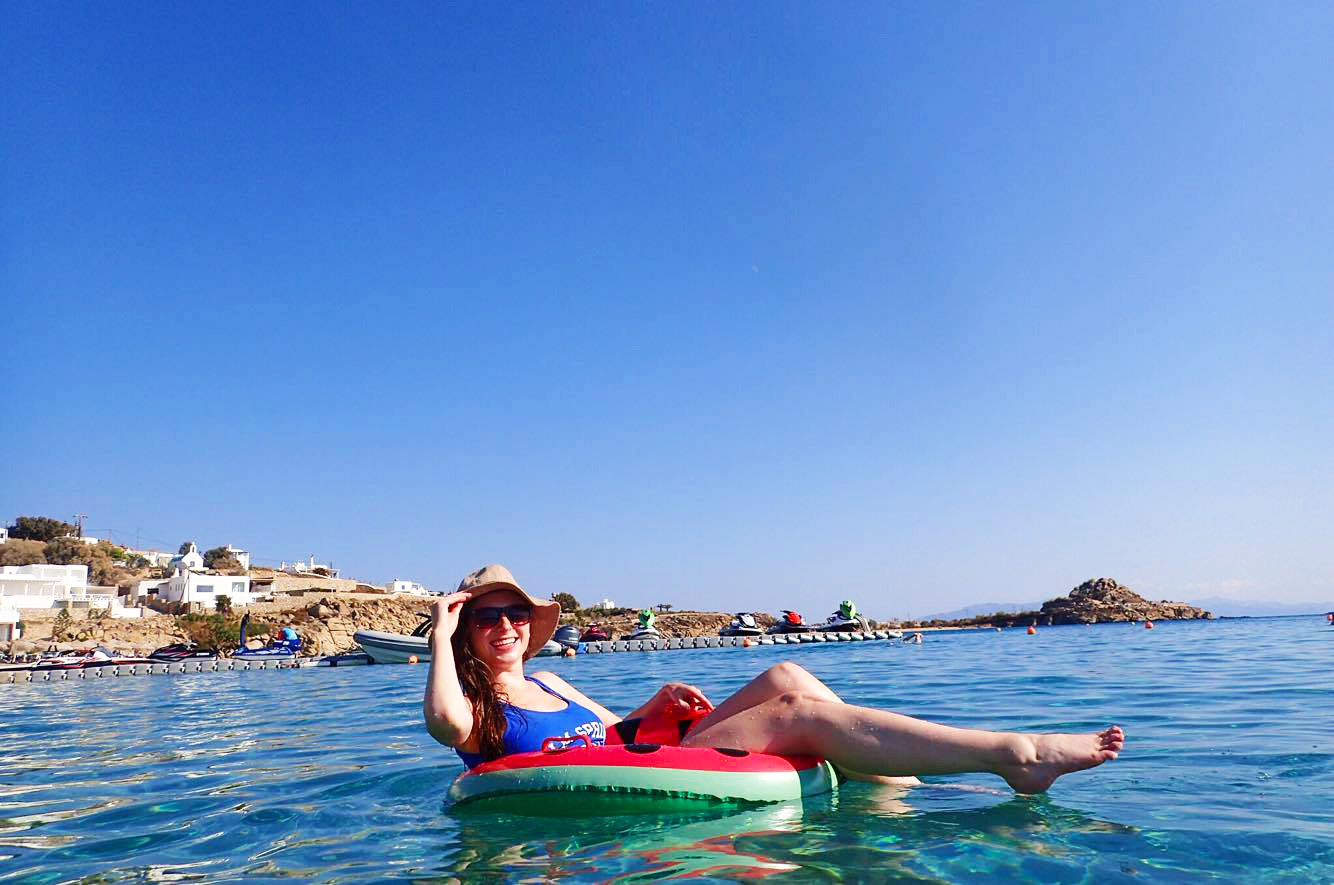 melissa carne in watermelon pool floatie on platis gialos beach on mykonos greece