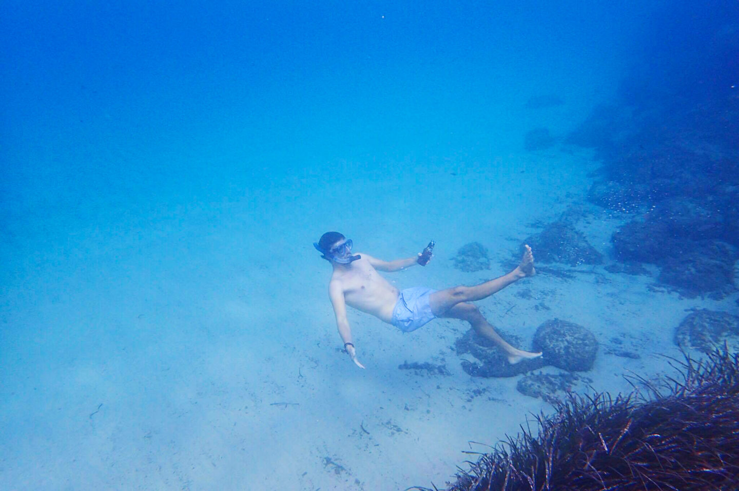 man-snorkelling-underwater
