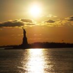 statue of liberty at sunset in new york
