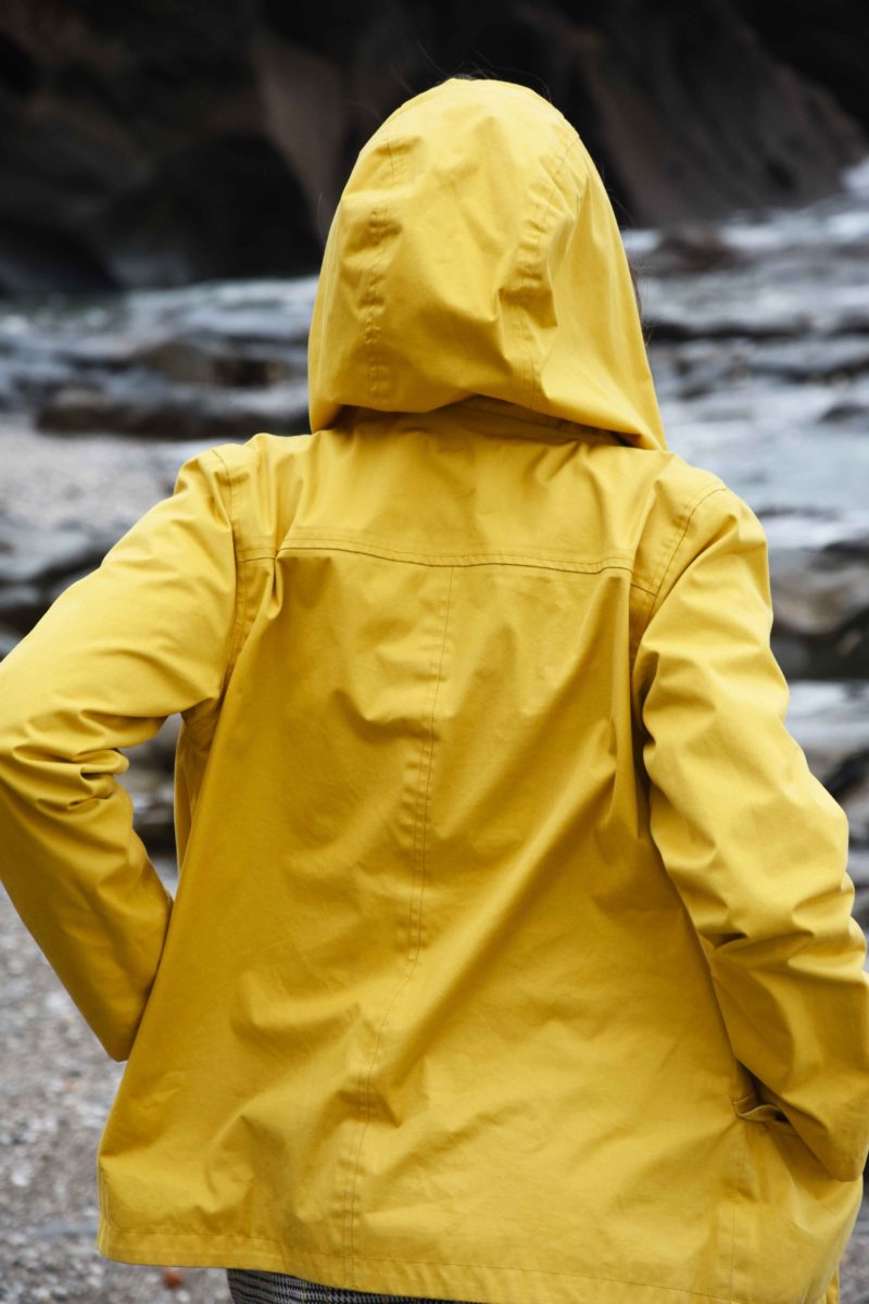 yellow seasalt sea folly jacket on beach in cornwall