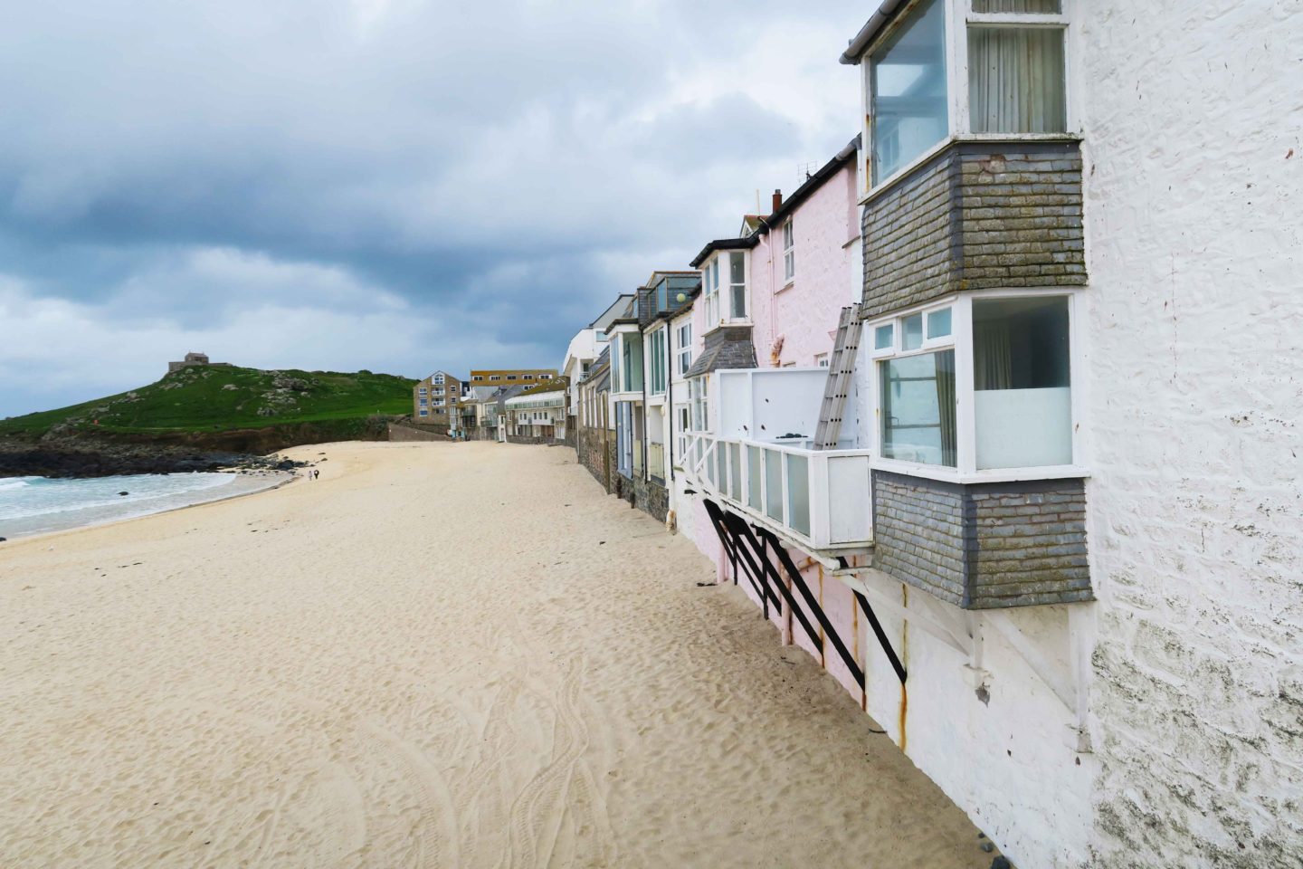 beach with houses on in cornwall