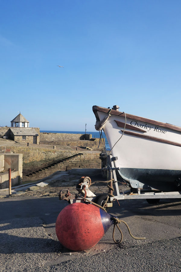 boat and buoy at charlestown in cornwall