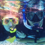melissa carne and sam gill snorkelling in the great barrier reef in australia