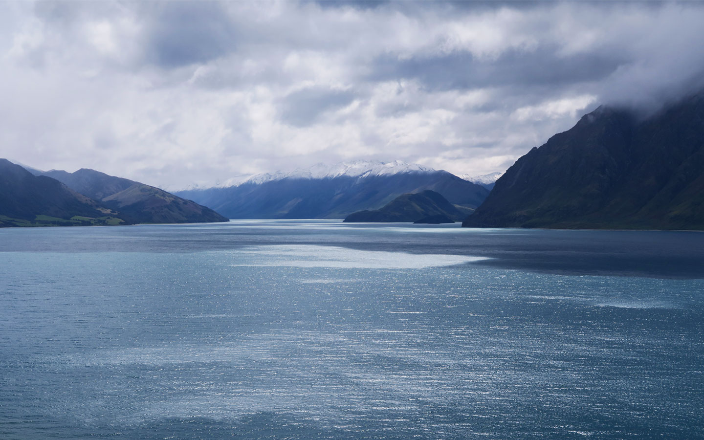 lake hawea with mountains in the background in new zealand