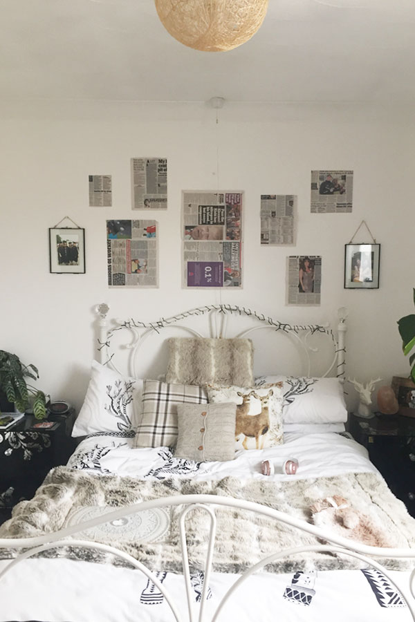using newspaper to plot out the layout of your gallery wall